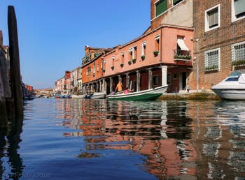 The reflections of the Rio dei Vetrai in front of the Fondamenta Daniele on the island of Murano in Venice.
