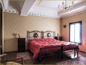 La Chambre Matrimoniale de la petite maison Ca' Rio Marin Garzoti en location à Venise.