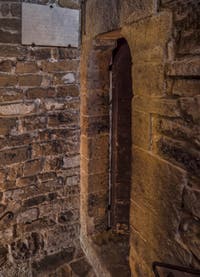 La porte d'entrée de la prison de la Tour Arnolfo du Palazzo Vecchio à Florence en Italie
